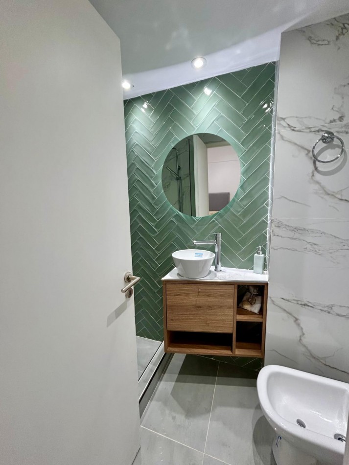 AMBIENTE EXTERNO, CON BALCON. A NUEVO.EQUIPADO.